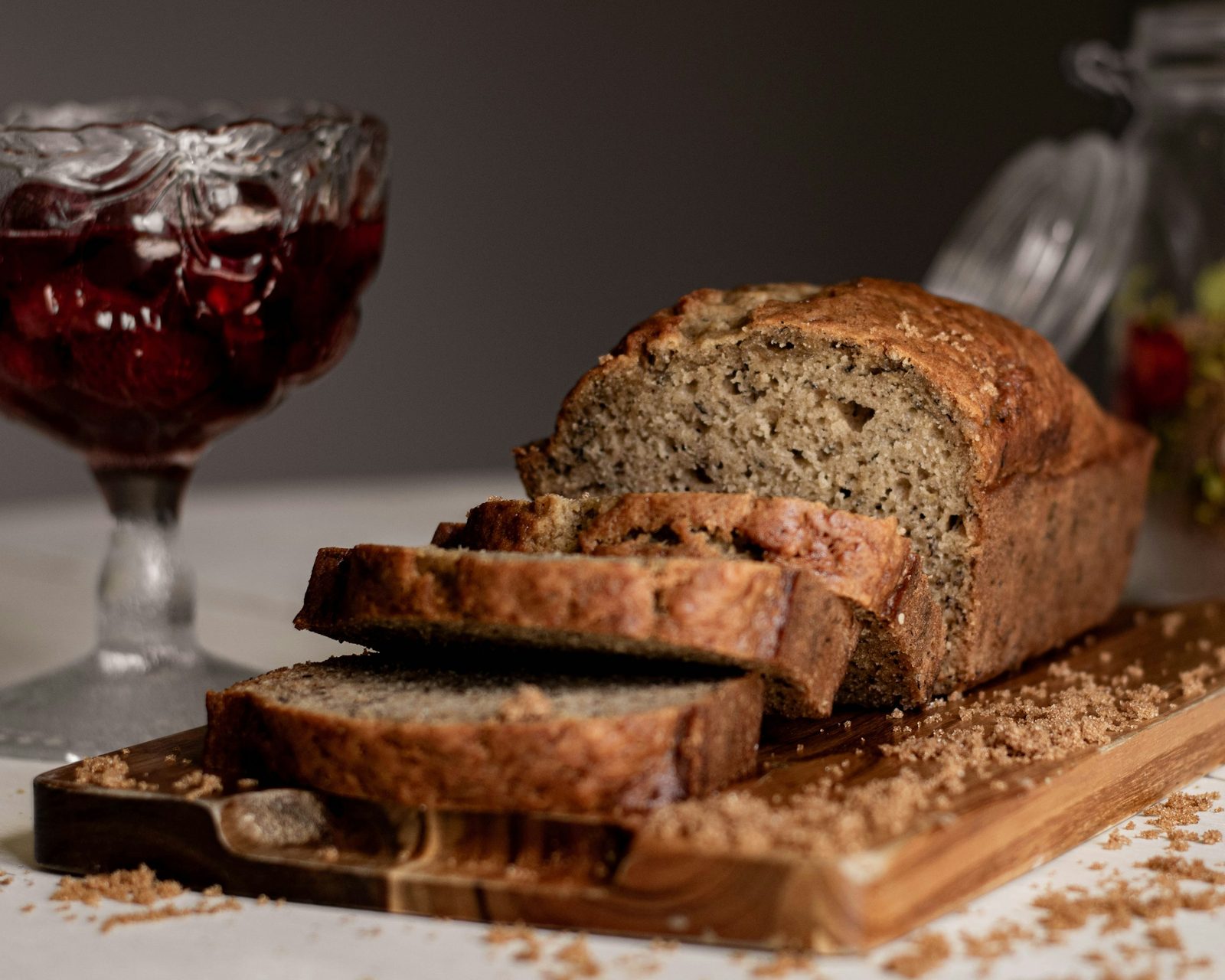 Banana Bread, sliced bread on brown wooden chopping board