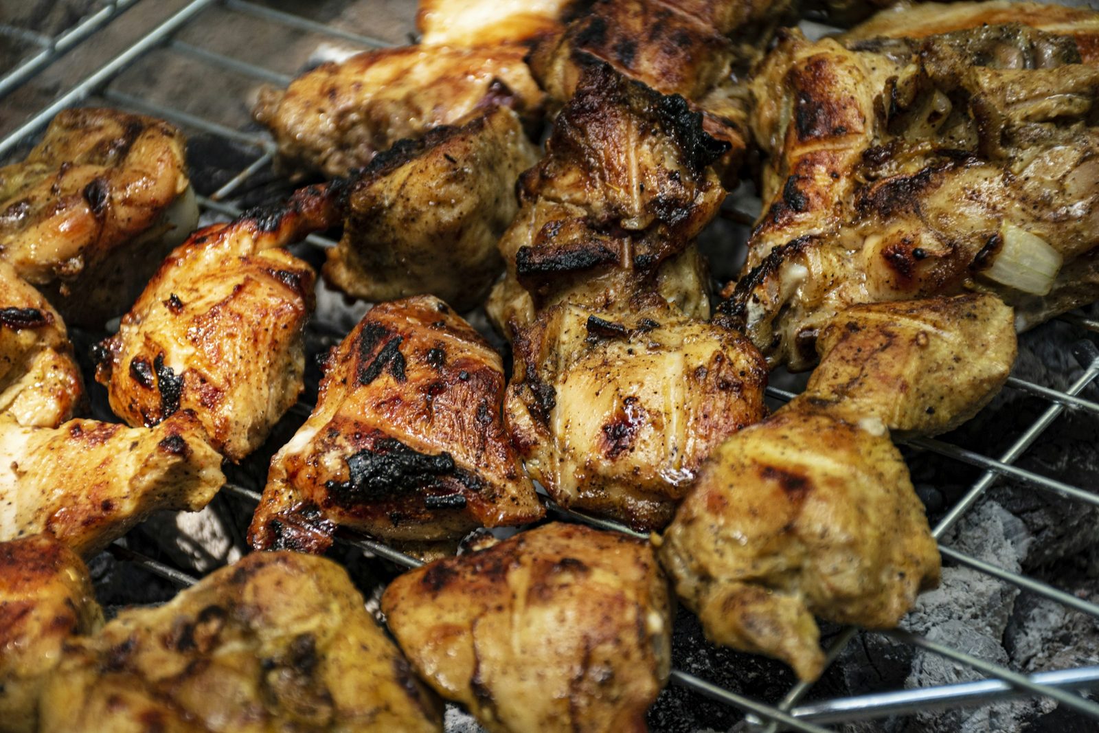 Thai Thai Chicken Marinade, grilled meat on black grill